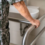 asian elderly woman patient use toilet bathroom